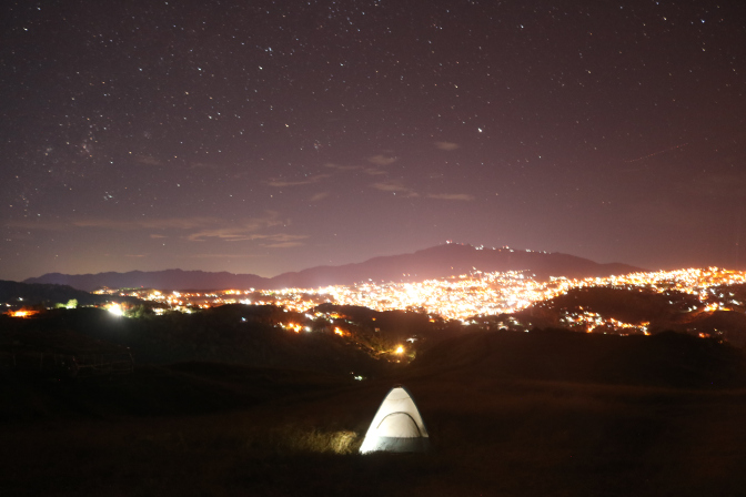 tent and the city lights