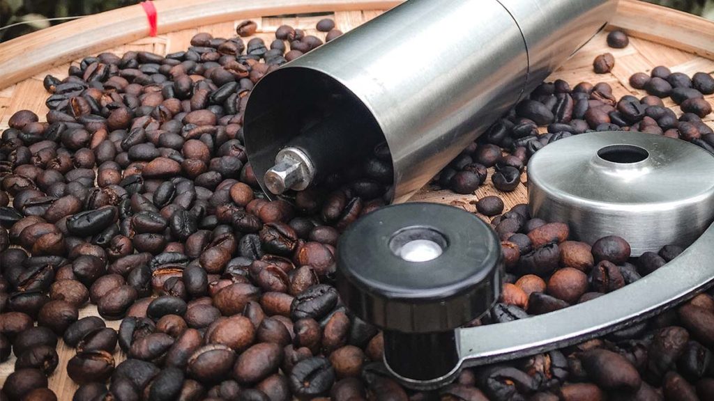Roasted coffee with coffee grinder